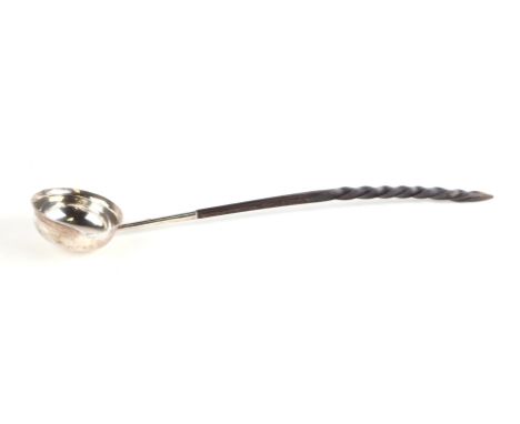 A Georgian silver toddy ladle, initialled, marks rubbed, with whalebone handle, 32cms long.