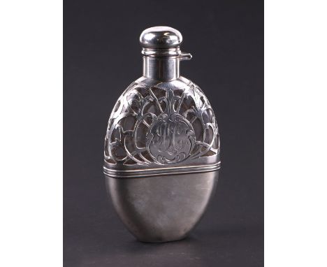 An American sterling silver hip flask with pierced decoration, initialled, 13.5cms high.