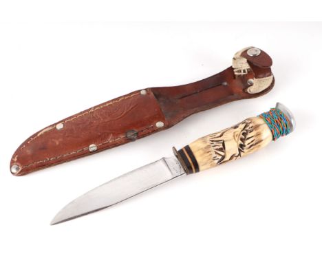 Early 20th century German sheath knife with carved stag horn handle in its original leather scabbard. Rubbed makers mark: CAR