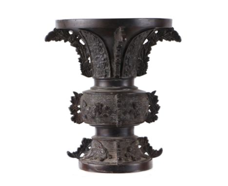 A Chinese bronze Gu vase of traditional form, 18cms high.