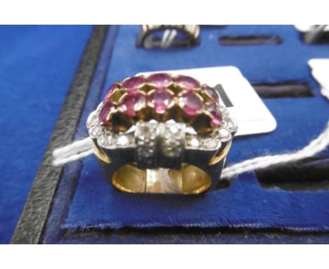 A 1940S RUBY AND DIAMOND ART DECO YELLOW METAL COCKTAIL RING