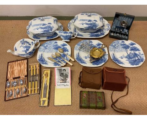 Collectors' items including blue and white pottery by Lakeland, boxes of plated ware and metalware, cameras, a vintage tin an