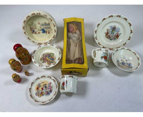Two sets of Bunnykins breakfast ceramics, a boxed Pelham puppet of a fairy and a graduated set of four Russian dolls.