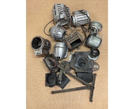 A quantity of mid 20th century film and theatre stage spotlights, all requiring restoration, and three wheeled strobe light b