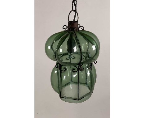A Venetian glass, hand blown green bubble pendant light with metal framework. H: 34cm