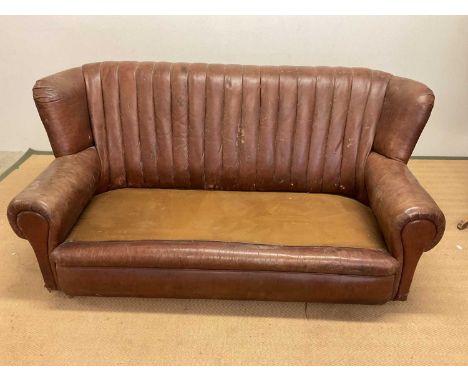 An Art Deco Swedish leather sofa, height 78cm, width 168cm, depth 95cm. Please note the seat cushions are missing.