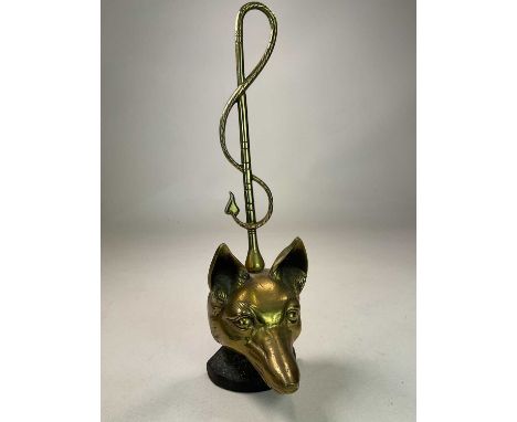 A brass and iron early 20th century doorstop on weighted base modelled as a fox head and whip with indistinct impressed mark 