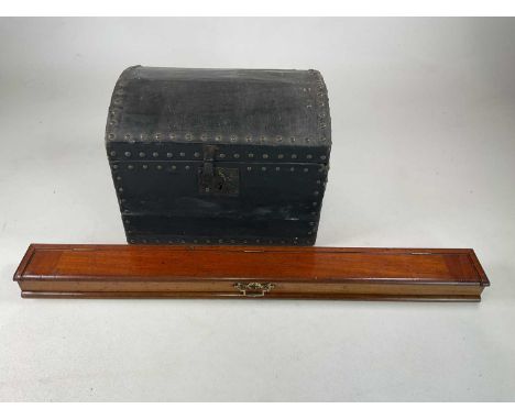 A mahogany desk top tidy, 6 x 87 x 9cm, and small black trunk with studs, 30 x 40 x 32cm.