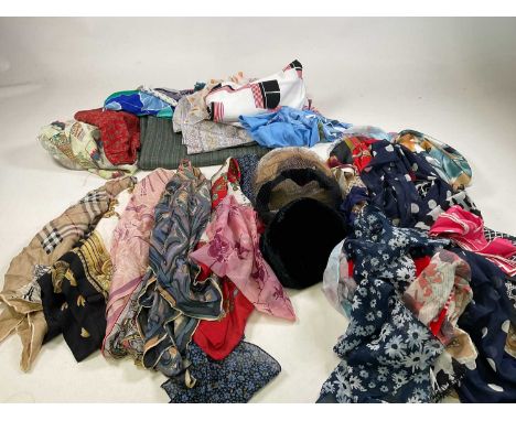 A collection of vintage accessories comprising a large quantity of scarves including a Burberry silk scarf, four hats and a q