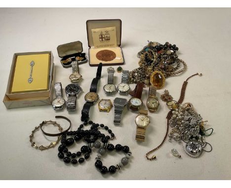 A quantity of costume jewellery including pendants on chains, also a group of vintage gentleman's wristwatches including a ch