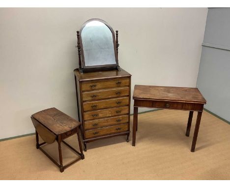 A small group of furniture comprising a six drawer chest, 102 x 68 x 46cm, a card table, a gateleg table and a table top mirr