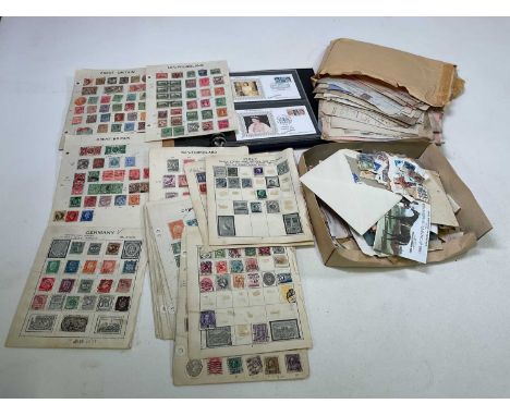 A group of ephemera including stamps, a very small collection of first day covers, a large quantity of ephemeral receipts, et