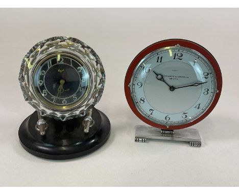 An Art Deco clock by Pleasance &amp; Harper Ltd on chrome base, height 21cm, and a Russian glass clock on bakelite and chrome