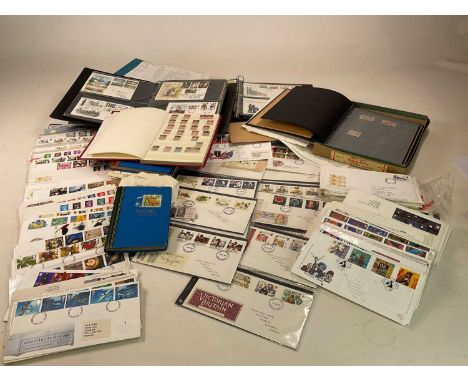 A large collection of stamps and first day covers to include albums etc.