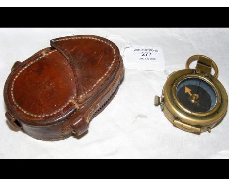 A First World War military compass in leather carrying case 