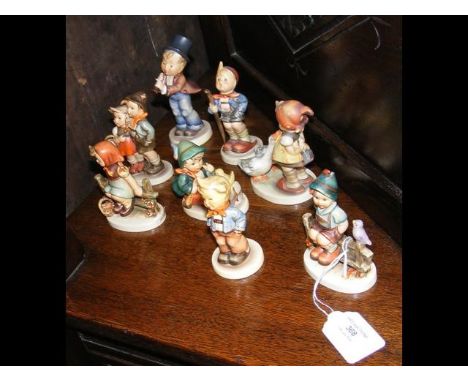 Eight Hummel figures CONDITION REPORTBy our judgement, condition of lot is good - some signs of wear but physically sound.Not