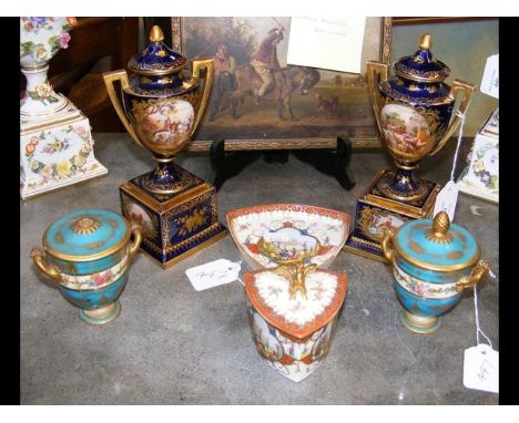 A pair of Sevres vase and covers, together with a pair of continental vase and covers and Augustus Rex cup and saucer with co