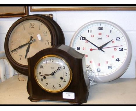 A trio of Smiths clocks: a school wall clock, an astral wall clock and a Bakelite striking mantel clock 