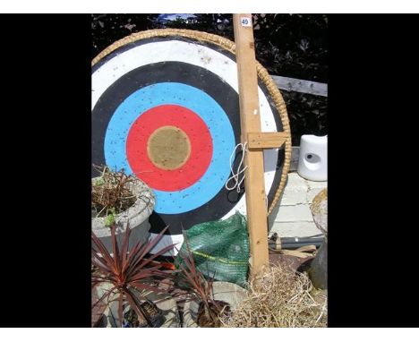 A Jaques of London archery target, together with stand and bow, etc.