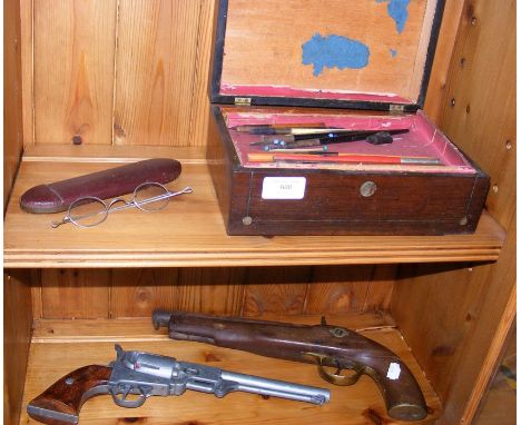 An antique flintlock pistol and revolver cap gun, together with a vintage paint brush box and pair of spectacles CONDITION RE