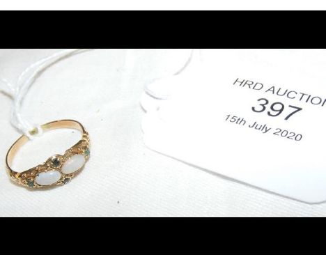 A lady's antique emerald and opal ring in gold setting CONDITION REPORTBy our judgement, condition of lot is good - some sign