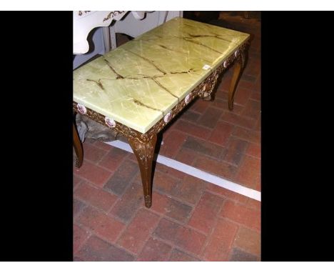 A vintage gilt coffee table with faux onyx top - length 90cm