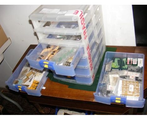 Six drawer unit of various model train kits and parts 