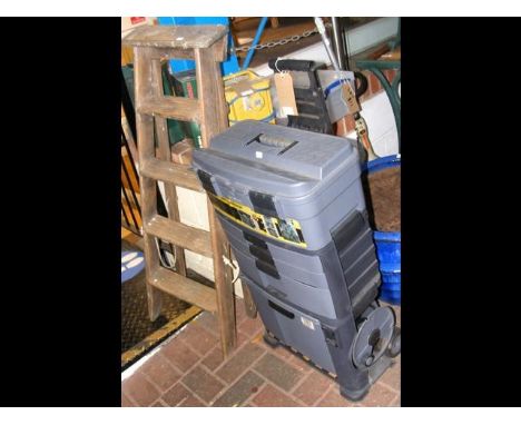 A Stanley rolling workshop together with a four rung wooden step ladder