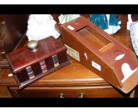 A Le Banquier casino card shoe and vintage poker chips in case