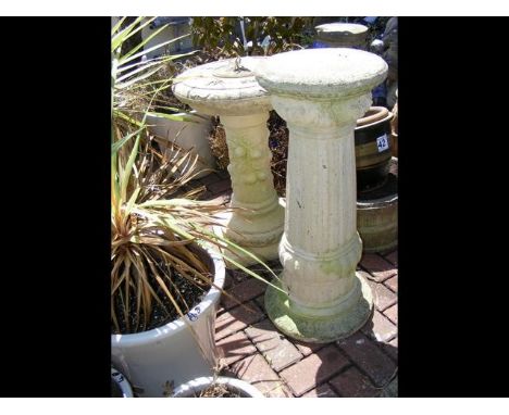 A garden sundial, together with decorative garden column 