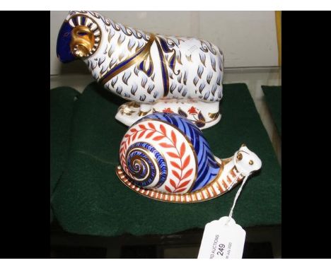 A Royal Crown Derby Ram paperweight, together with Snail CONDITION REPORTFor your attention, the stoppers on these paperweigh