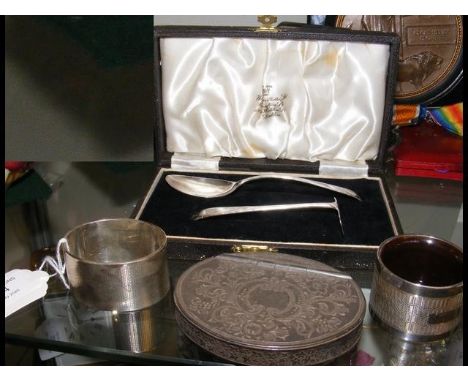 A snuff box, silver napkin rings, etc. 