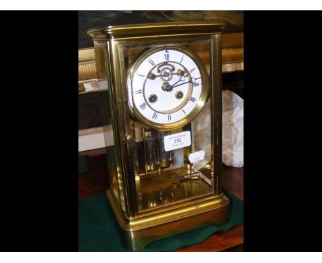 A 30cm high four glass mantel clock with visible escapement and mercury pendulum CONDITION REPORTBy our judgement, lot is in 