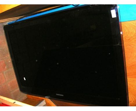 A 40 inch flat screen Samsung TV, model number UE40B7000WWXXU. Includes remote, power and HDMI cable 