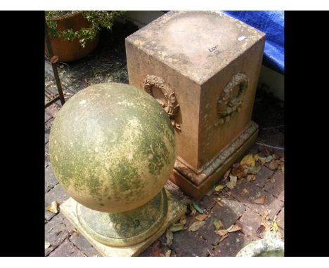 A garden plinth, together with a circular finial 