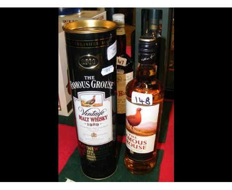 A bottle of The Famous Grouse Vintage Malt Whisky 1989 in presentation tube, together with one other 