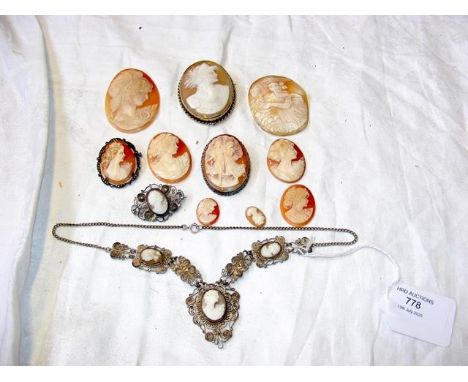 A box of vintage cameos