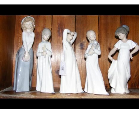 A cluster of five 'Nao by Lladro' figurines, including one of a yawning girl 