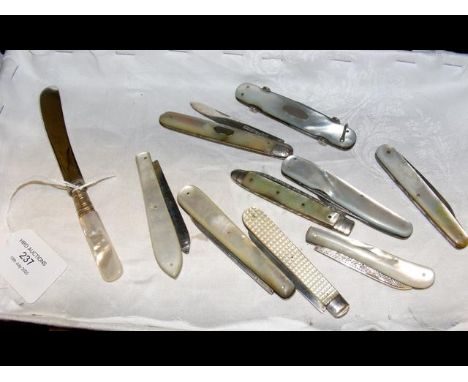 A selection of Mother of Pearl handled and silver fruit knives 