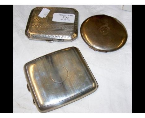 Two silver cigarette cases, together with a compact 