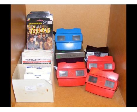 A stock of view master slides, alongside 6 vintage view masters 