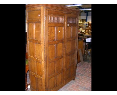 Ipswich style oak cupboard with panelled doors CONDITION REPORTWe can confirm that this item is of solid wood construction.By