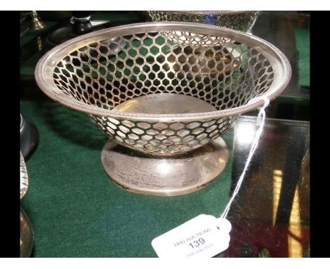 A pierced silver basket - 18cm diameter 
