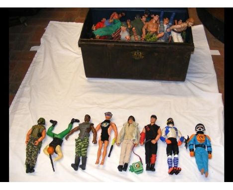 A metal trunk containing a large selection of vintage Action Man figures 