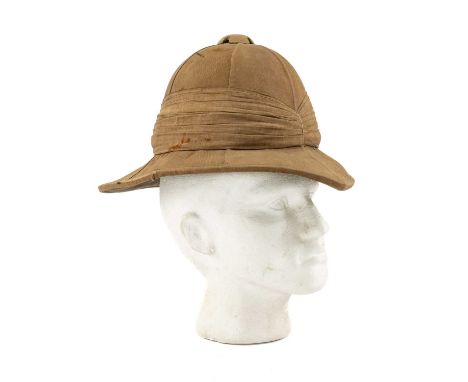 THE MILITARY CLUB HOUSE: WORLD WAR I ROYAL WELCH FUSILIERS PITH HELMET in khaki canvas and fine cotton ribbon, handwritten in