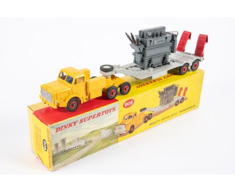 A Dinky Supertoys Mighty Antar with Transformer load (908). Yellow tractor unit with grey trailer, red supertoy wheels and pl