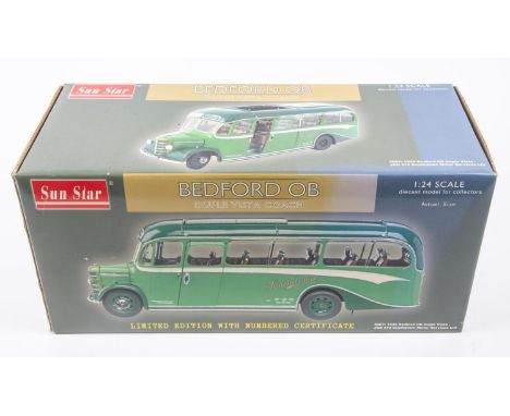 A Sun Star 1:24 scale Bedford OB Coach. In Southdown two-tone green livery. Registration No. JCD 370. A finelydetailed model.