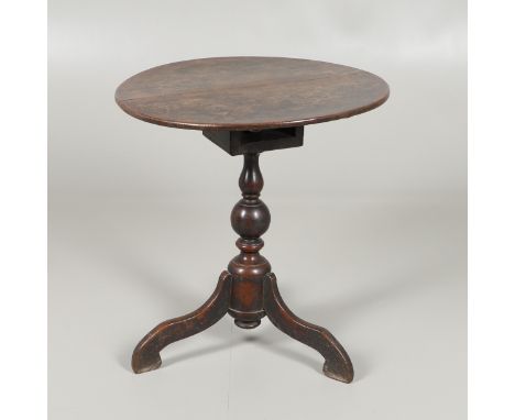 the circular tilt top on birdcage and turned column, to shaped swept legs, height 66cm, diameter 62cm. *CR Repair to top, fin