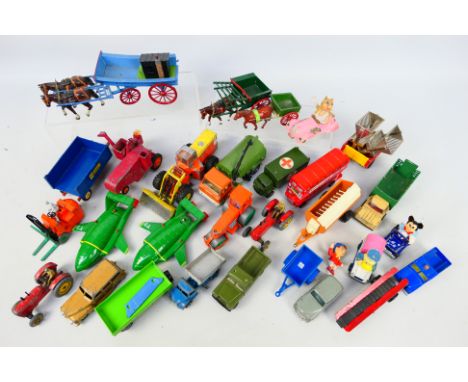 Britains - Dinky Toys - Corgi. A selection of approx. Thirty loose diecast vehicles and farm equipment appearing in Playworn 