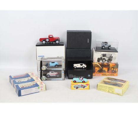 Atlas Editions - Universal Hobbies - Lledo  Matchbox - Others 14 boxed diecast model vehicles in a variety of scales. Lot inc